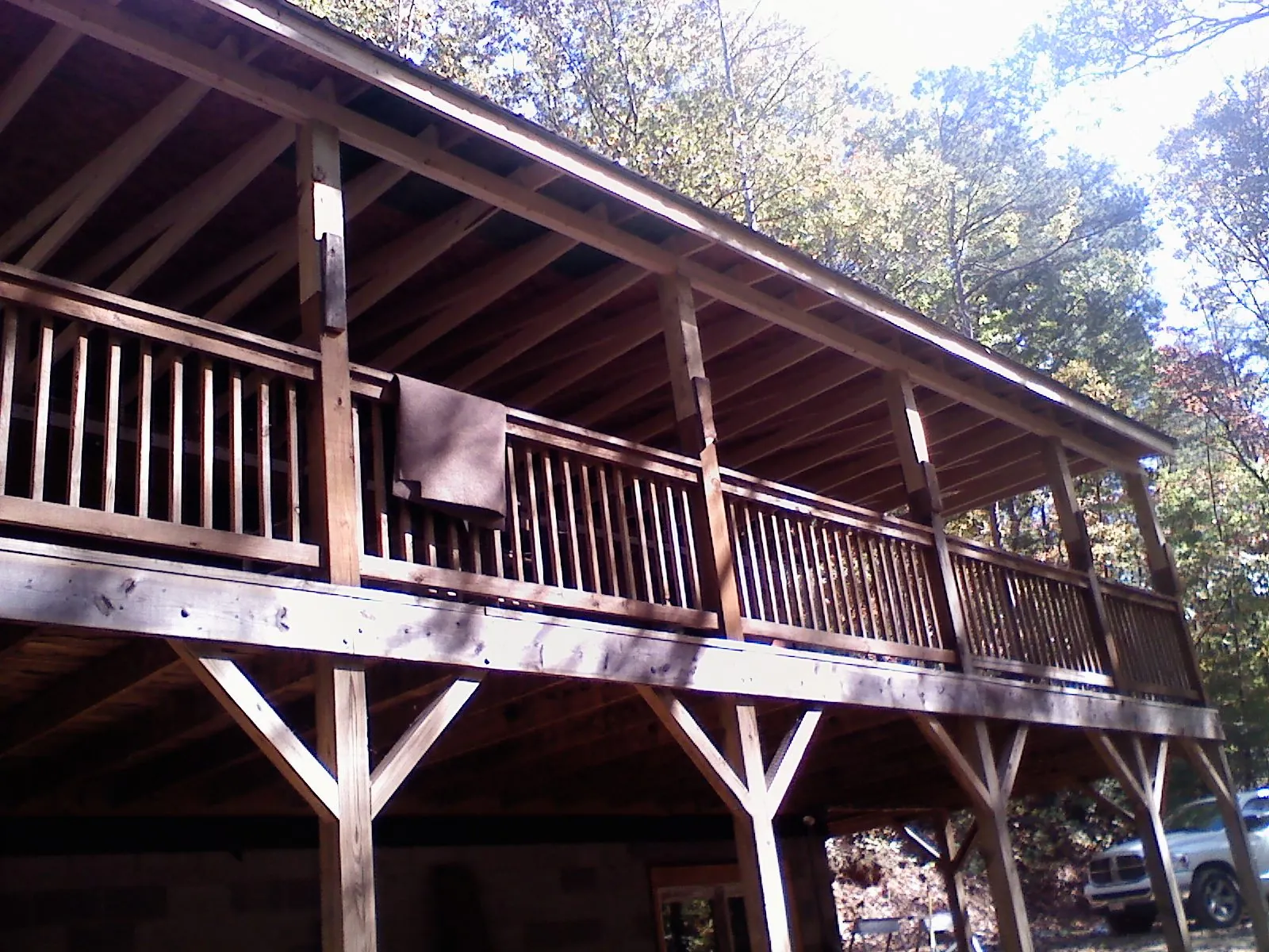 Timber framing under a new elevated porch and deck — Roof Leak Repair in Locust Hill by Roofing Brothers